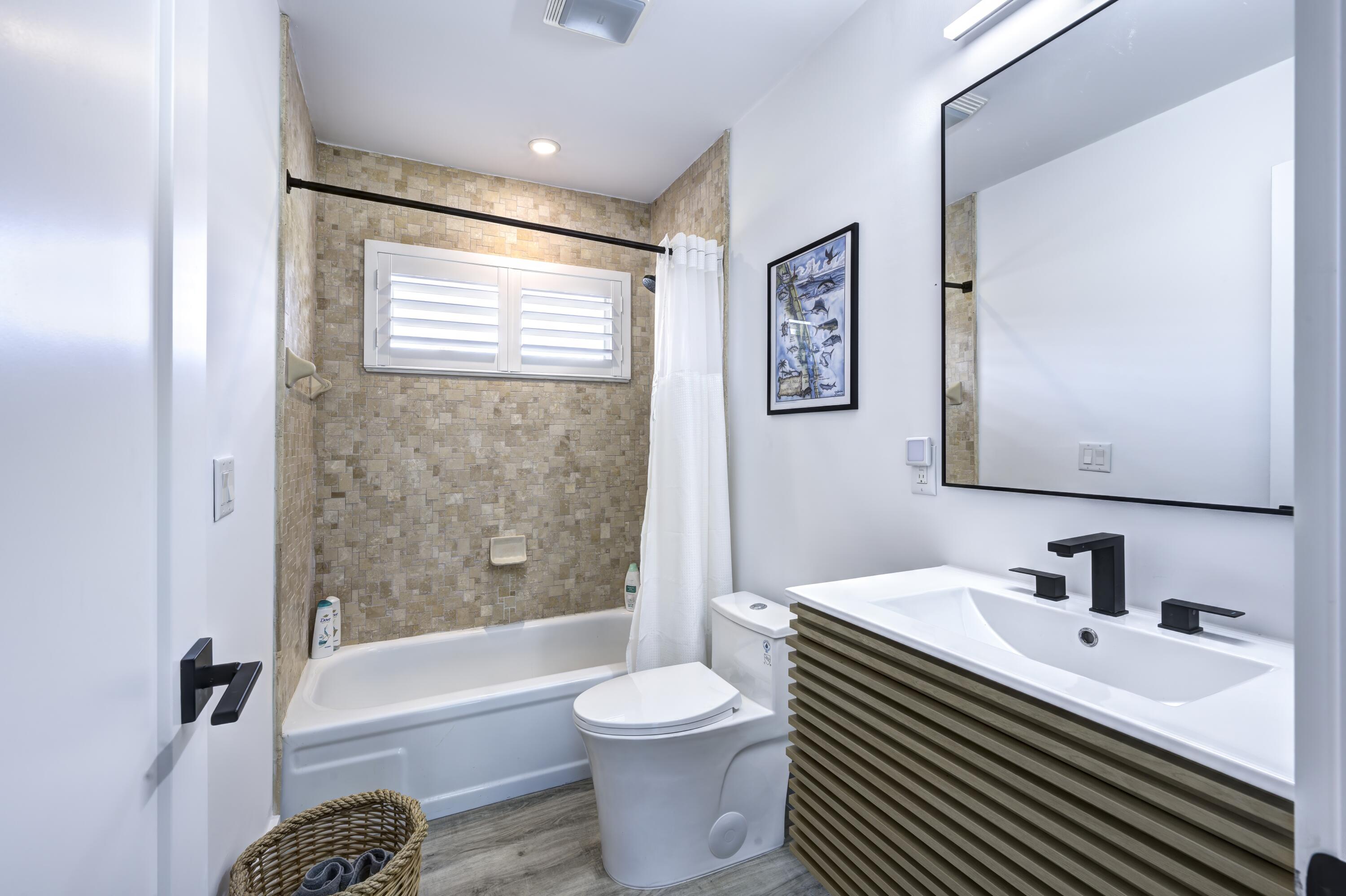 8585 Southeast Palm Street Hobe Sound, FL 33455 - Photo 23 of 43 Guest Bath