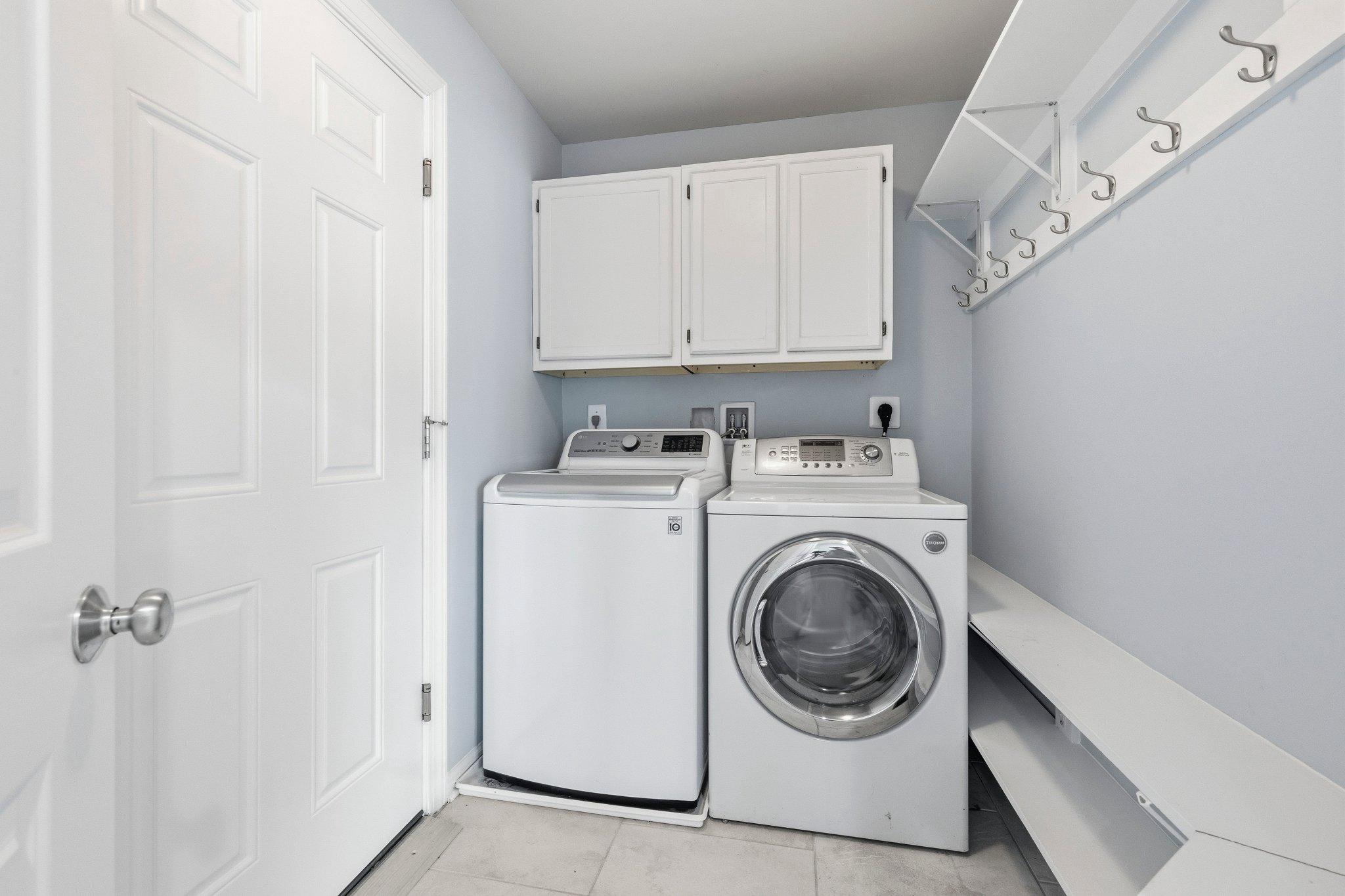 1105 Verbena Court Silver Spring, MD 20906 - Photo 27 of 78 Main level laundry next to the garage entry.