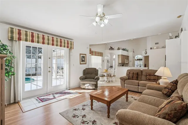 a living room with furniture and a window