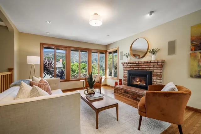 a view of a chairs and table on the deck