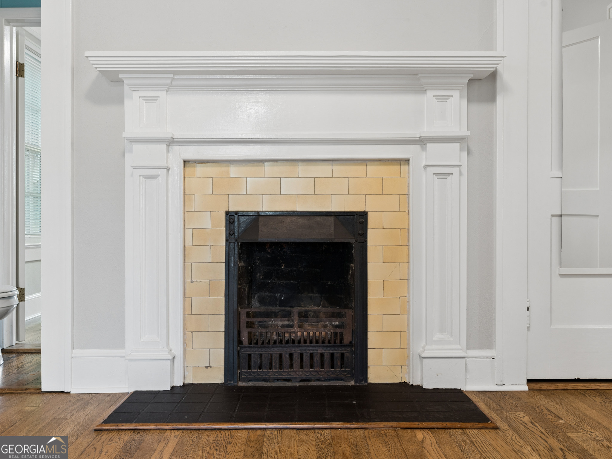 183 Athens Street Hartwell, GA 30643 - Photo 11 of 19 a view of a livingroom with furniture and a fireplace