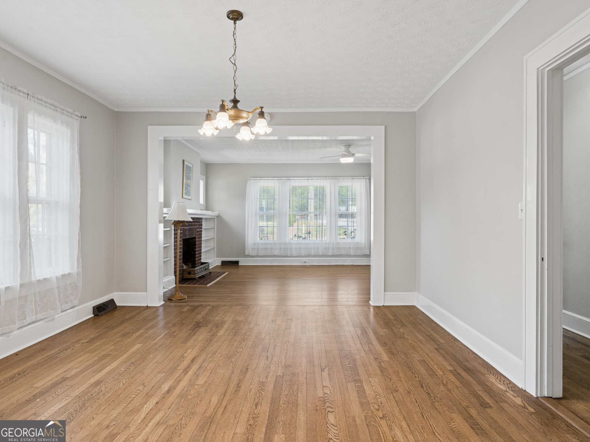 183 Athens Street Hartwell, GA 30643 - Photo 14 of 19 a view of livingroom with hardwood floor and window