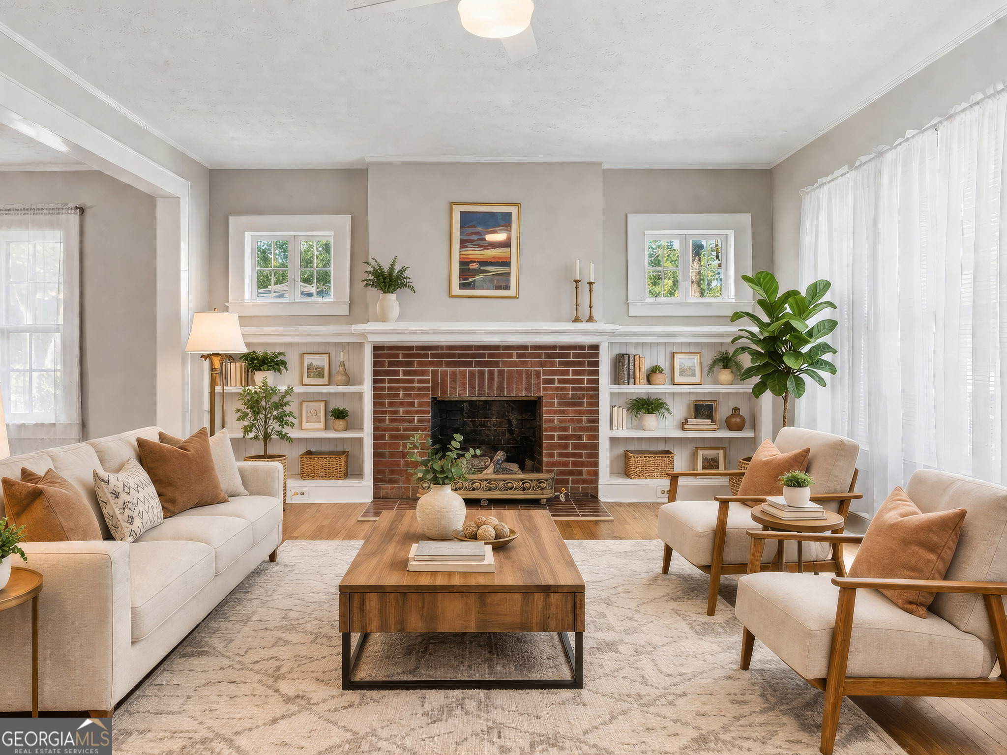 183 Athens Street Hartwell, GA 30643 - Photo 2 of 19 a living room with furniture large window and a fireplace