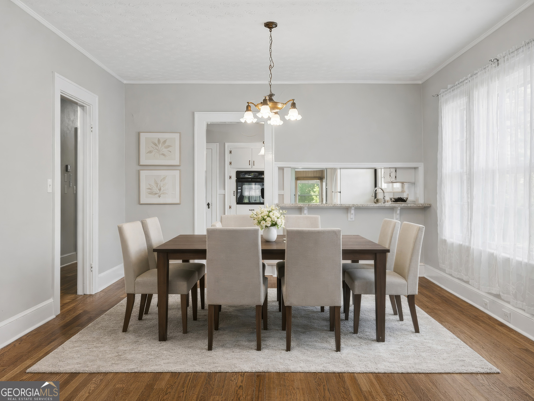 183 Athens Street Hartwell, GA 30643 - Photo 3 of 19 a view of a dining room with furniture window and wooden floor