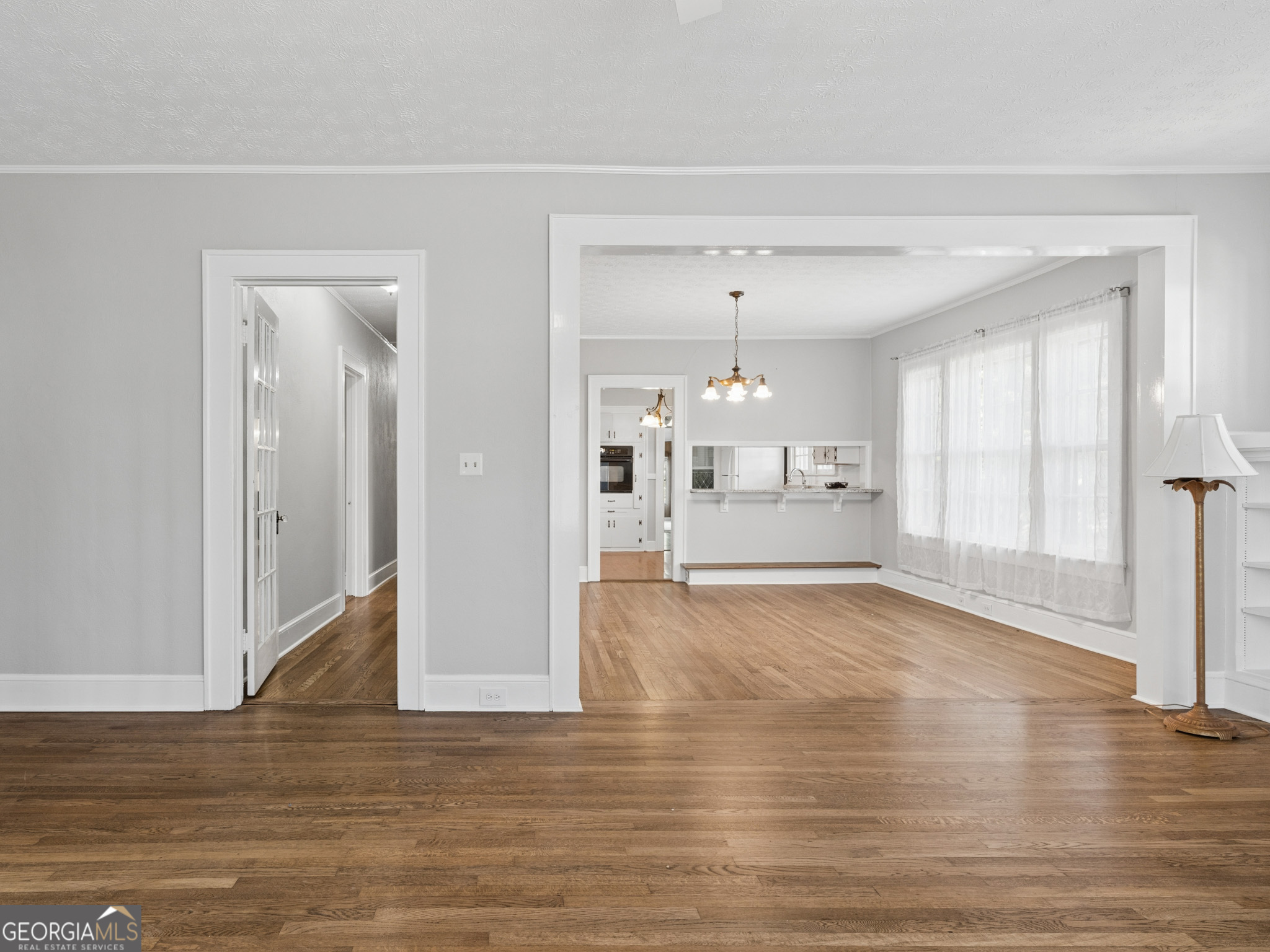 183 Athens Street Hartwell, GA 30643 - Photo 10 of 19 a view of a livingroom with wooden floor