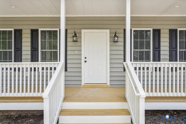 a view of a balcony with door