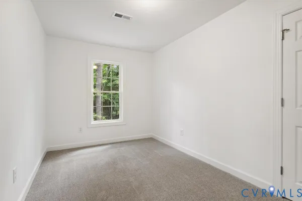 an empty room with a window