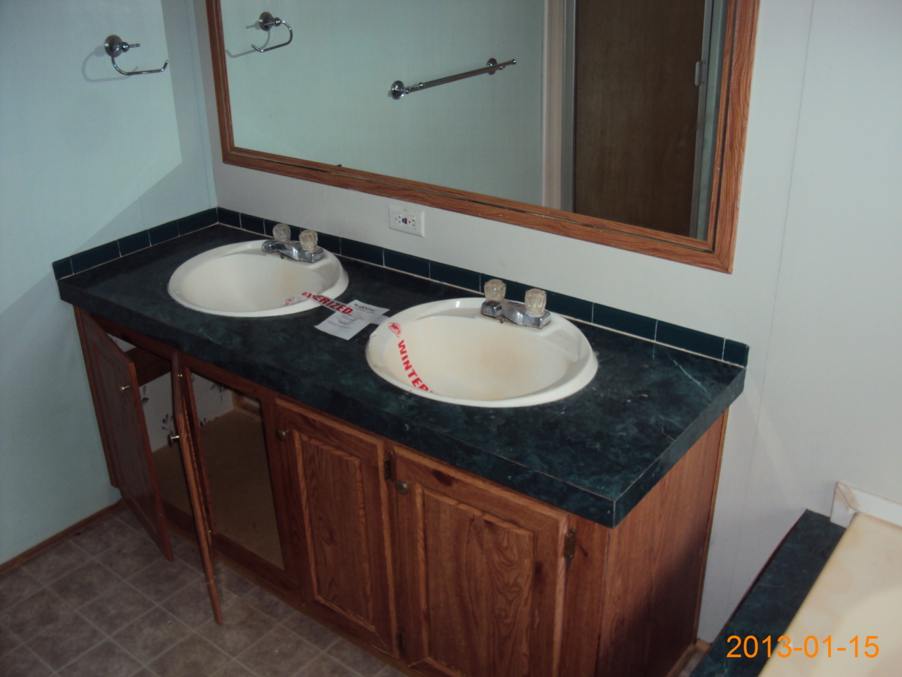2662 Nester Road Thaxton, VA 24174 - Photo 8 of 12 a bathroom with a granite countertop sink and a mirror
