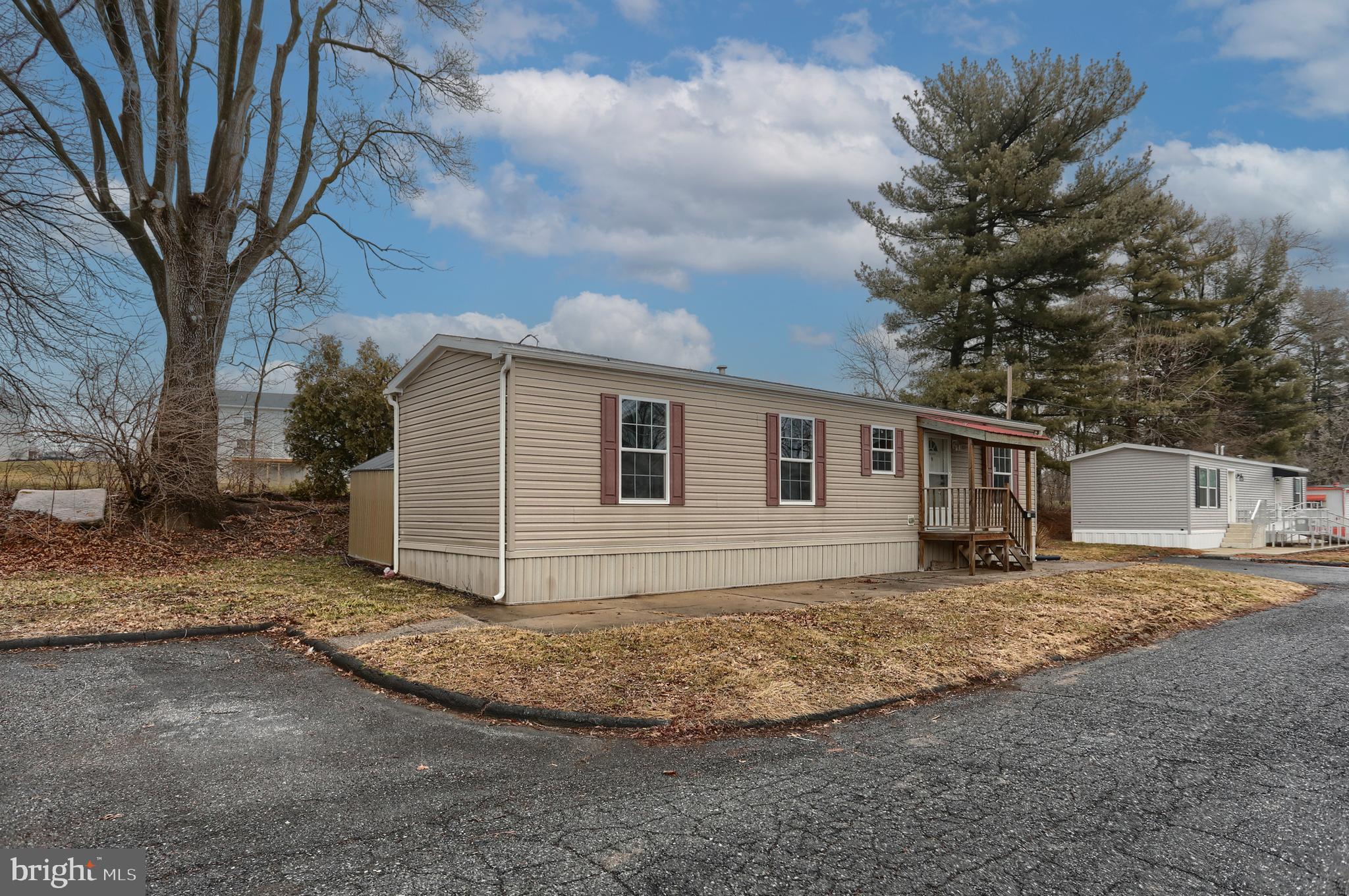 14 Shellie Street Lebanon, PA 17046 - Photo 3 of 19 a view of a yard in front of a house with large tree