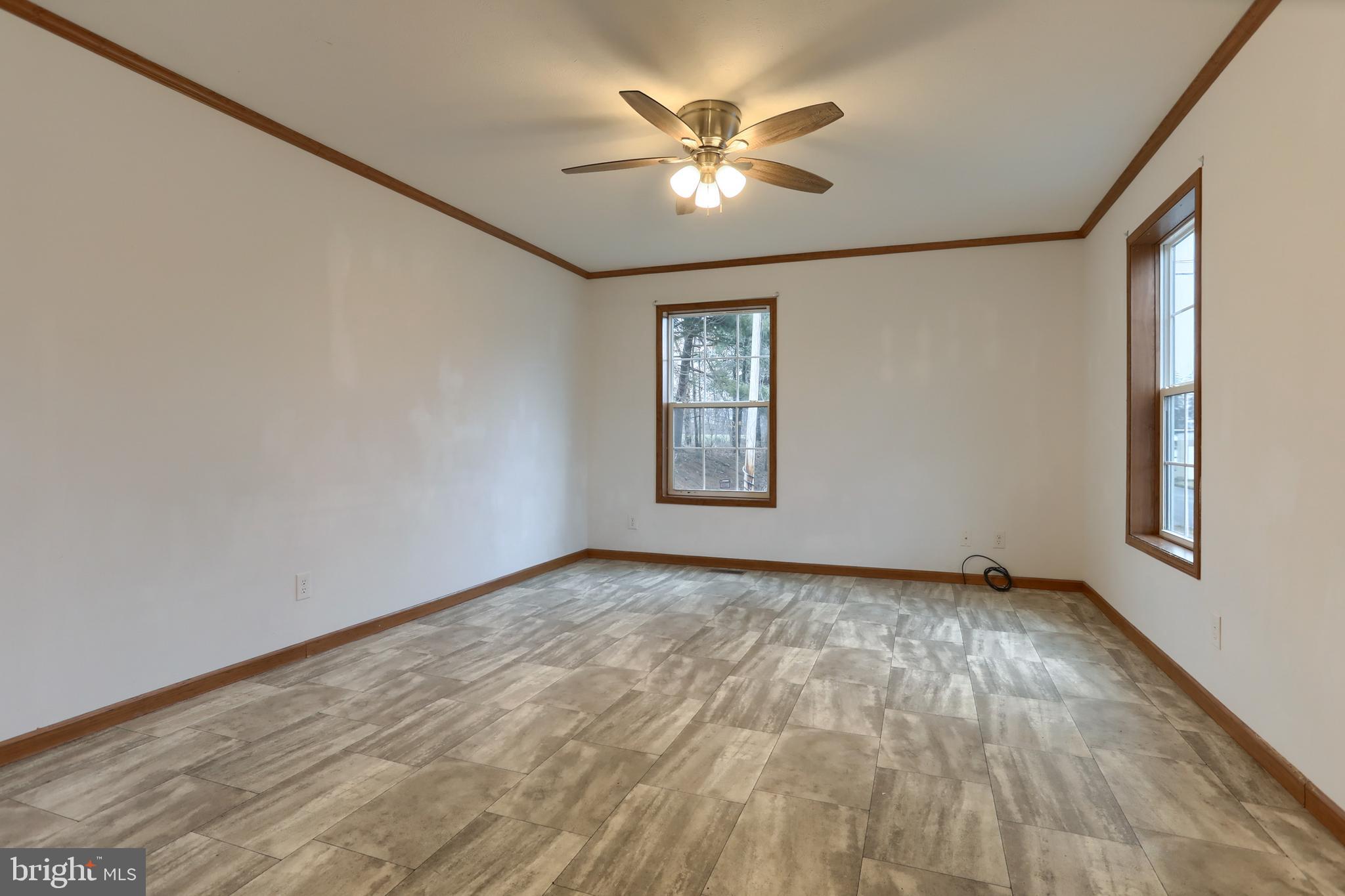 14 Shellie Street Lebanon, PA 17046 - Photo 5 of 19 a view of an empty room with window and wooden floor