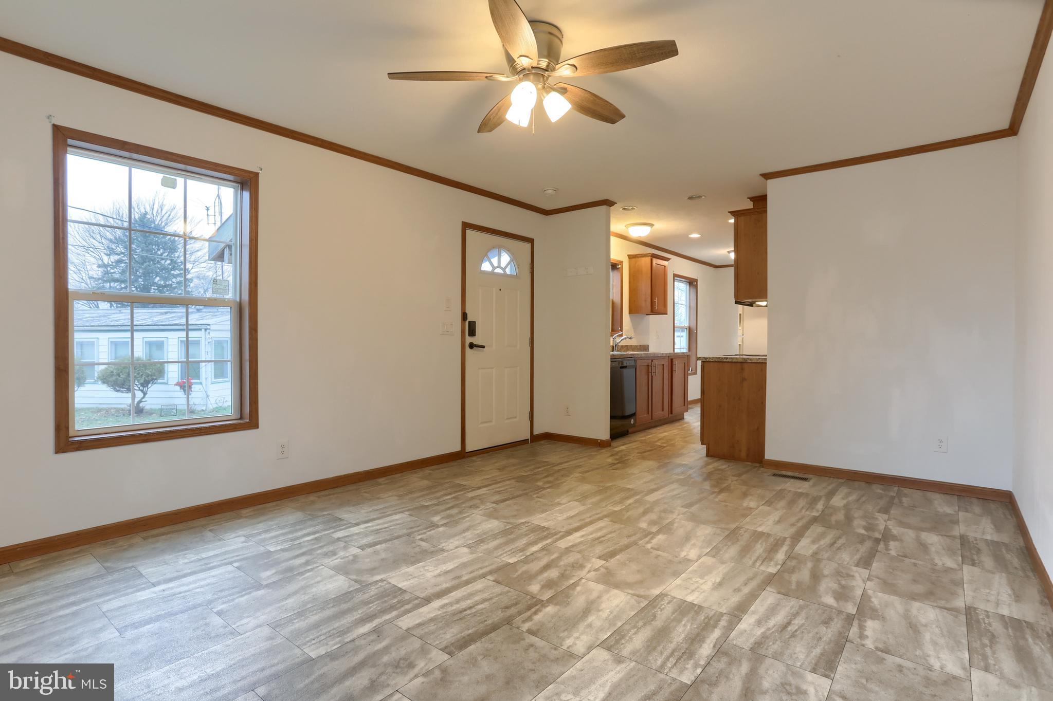 14 Shellie Street Lebanon, PA 17046 - Photo 6 of 19 a view of empty room with wooden floor and fan