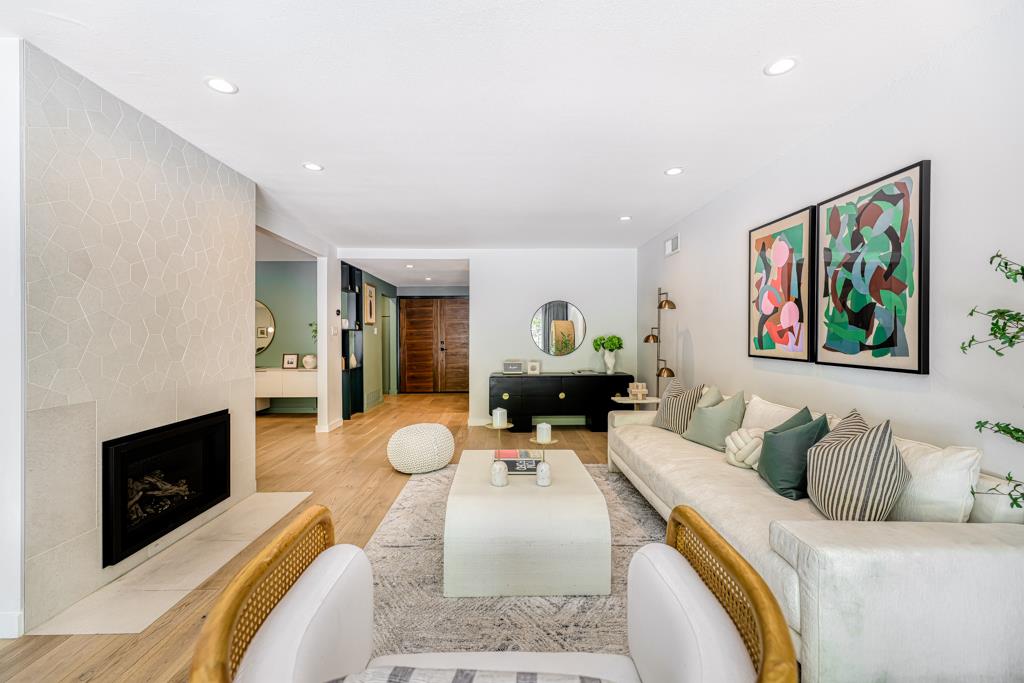 1349 Murchison Drive Millbrae, CA 94030 - Photo 11 of 66 a living room with furniture and a fireplace