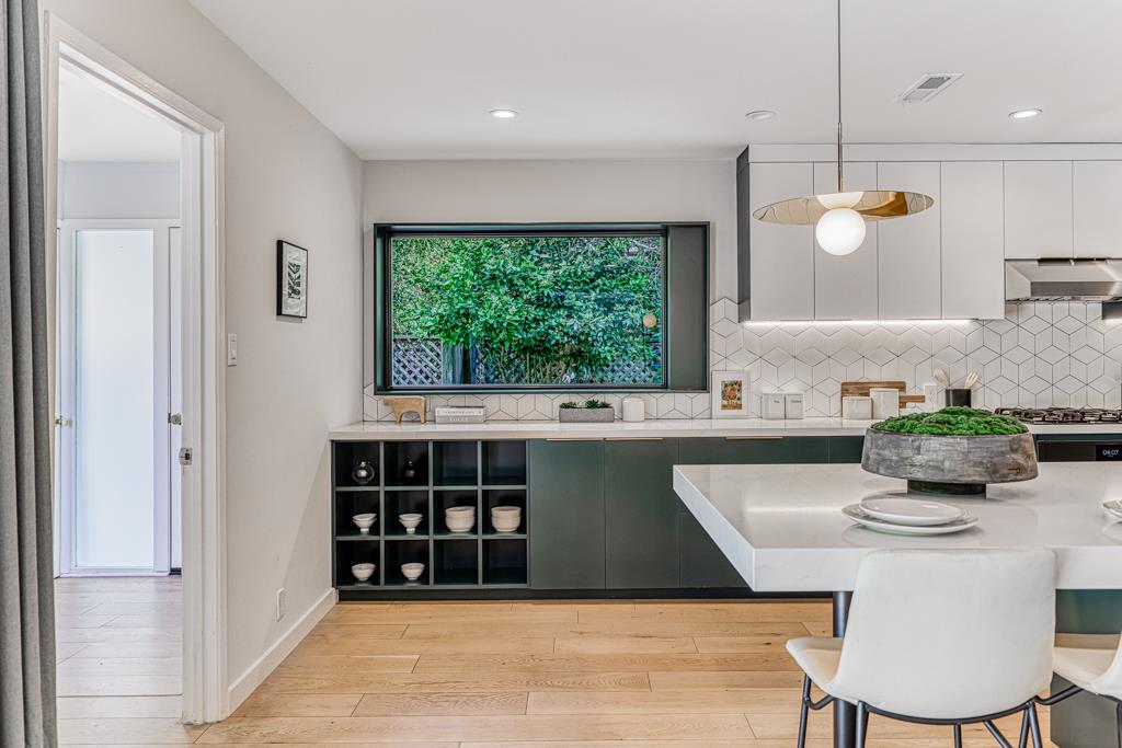 1349 Murchison Drive Millbrae, CA 94030 - Photo 21 of 66 a kitchen with a table and chairs
