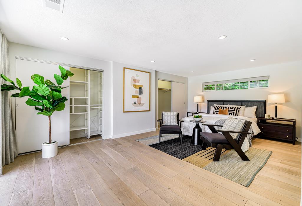 1349 Murchison Drive Millbrae, CA 94030 - Photo 33 of 66 a living room with furniture a potted plant and a table