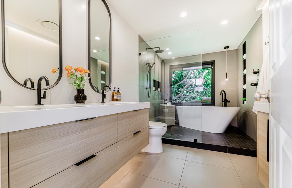 1349 Murchison Drive Millbrae, CA 94030 - Photo 37 of 66 a bathroom with a sink and a mirror