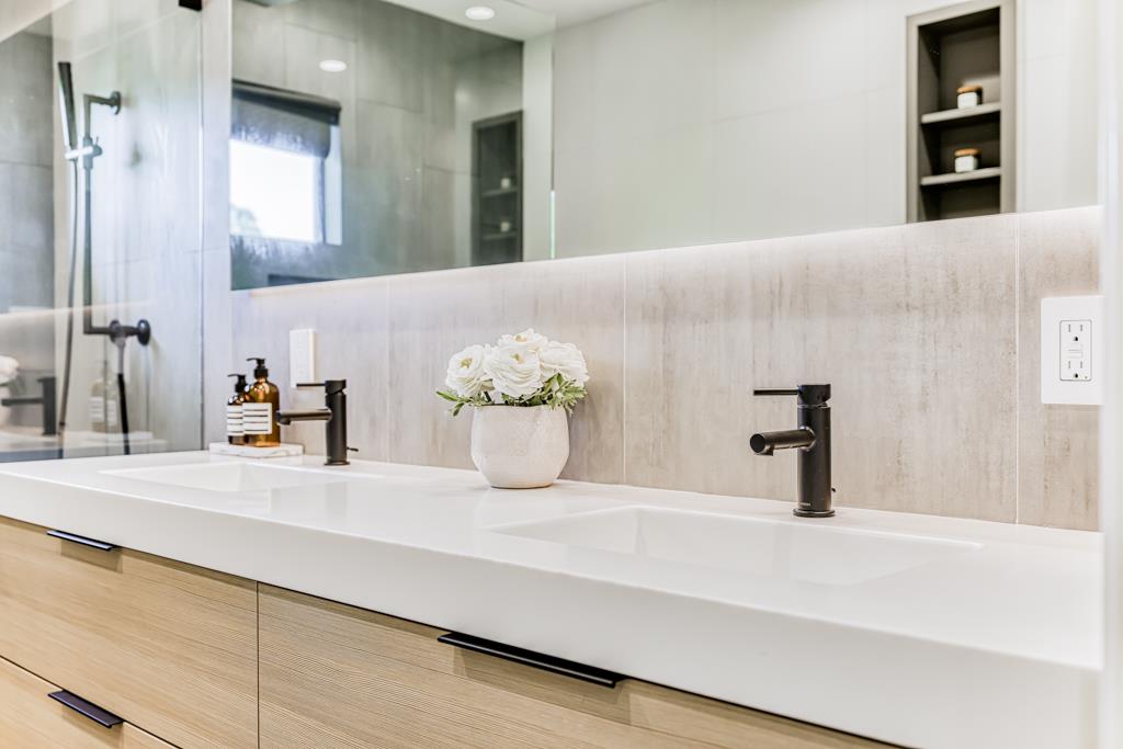 1349 Murchison Drive Millbrae, CA 94030 - Photo 54 of 66 a bathroom with a sink and a mirror