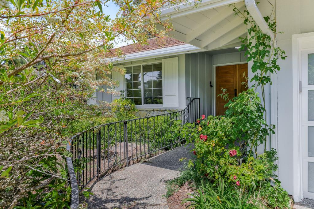 1349 Murchison Drive Millbrae, CA 94030 - Photo 58 of 66 a view of a house with a small yard and plants