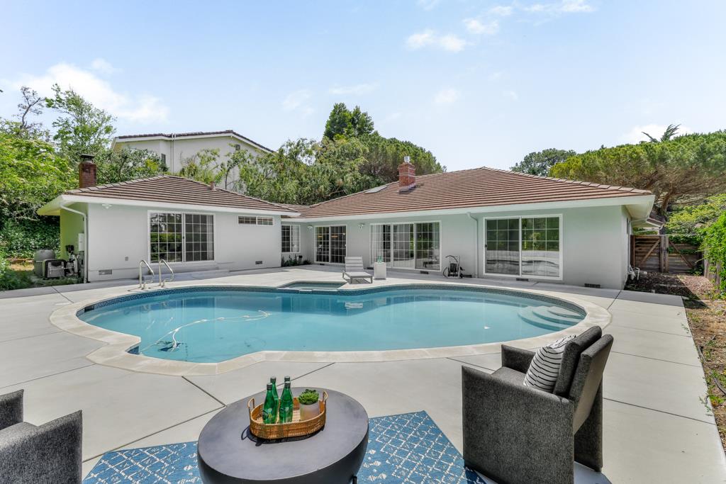1349 Murchison Drive Millbrae, CA 94030 - Photo 61 of 66 a front view of a house with swimming pool having outdoor seating
