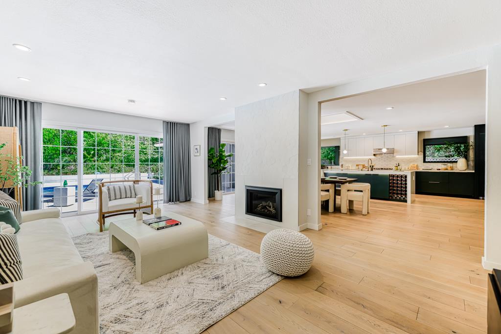 1349 Murchison Drive Millbrae, CA 94030 - Photo 7 of 66 a living room with furniture and a flat screen tv
