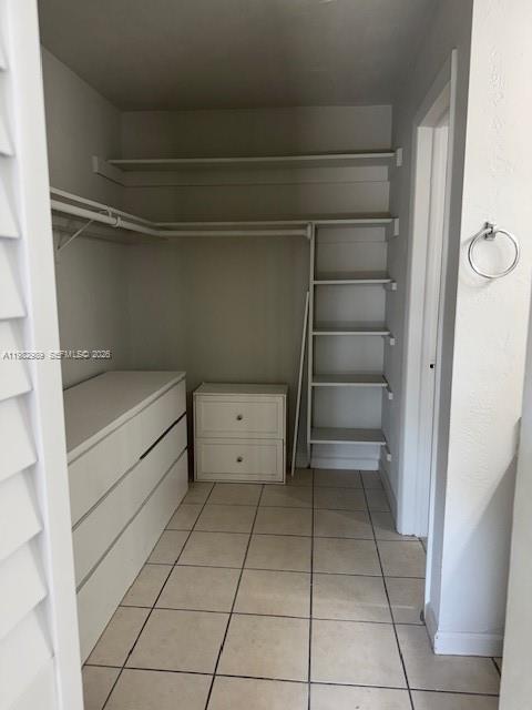8601 Southwest 68th Court, Unit 23 Pinecrest, FL 33156 - Photo 4 of 9 a view of an empty walk in closet