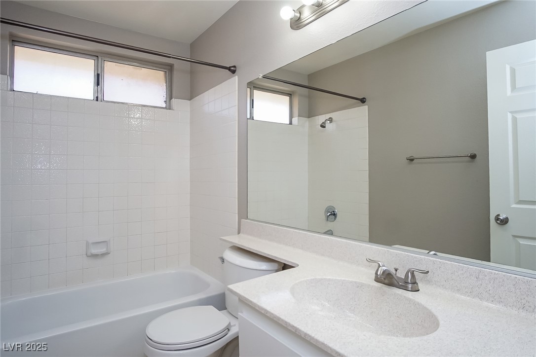 7118 Shadow Crest Drive Las Vegas, NV 89119 - Photo 14 of 15 Full bathroom with shower / tub combination, toile