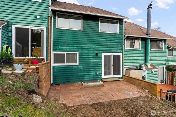 a front view of a house with a garage