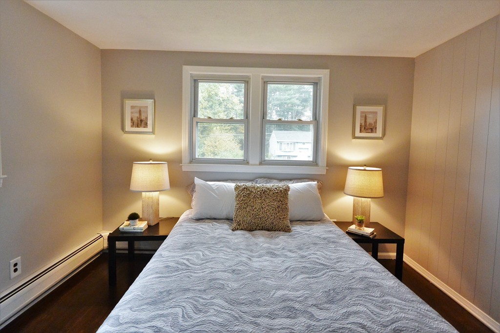 4 Weathervane Road Billerica, MA 01821 - Photo 16 of 30 a bedroom with a bed and a lamp