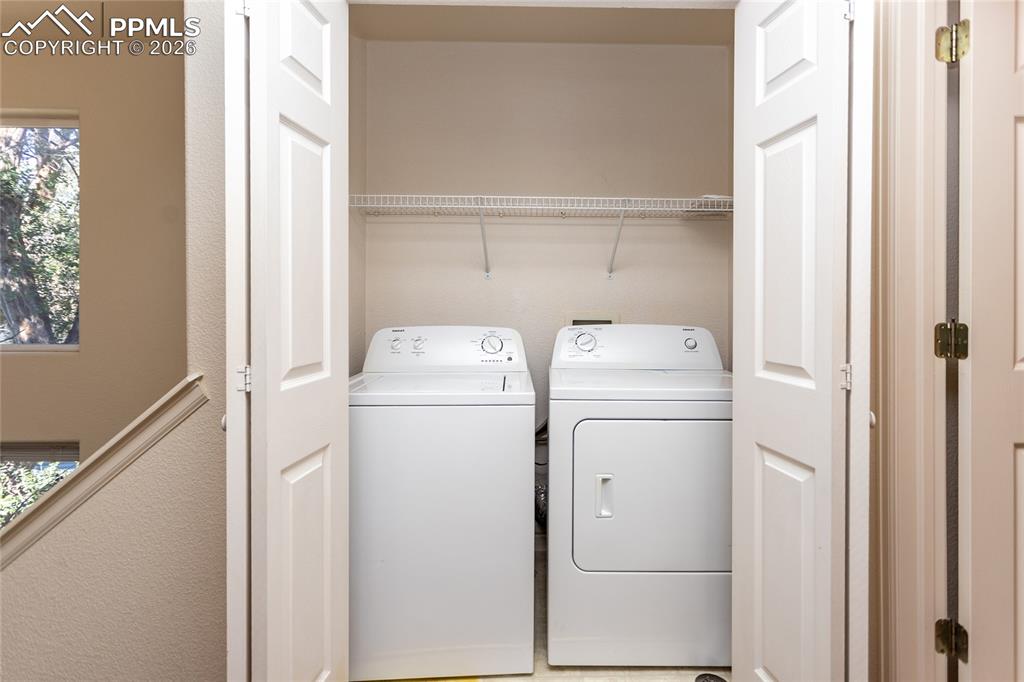 414 West Cheyenne Road Colorado Springs, CO 80906 - Photo 22 of 45 a utility room with dryer and washer