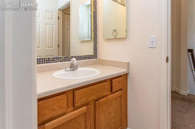a sink with a mirror