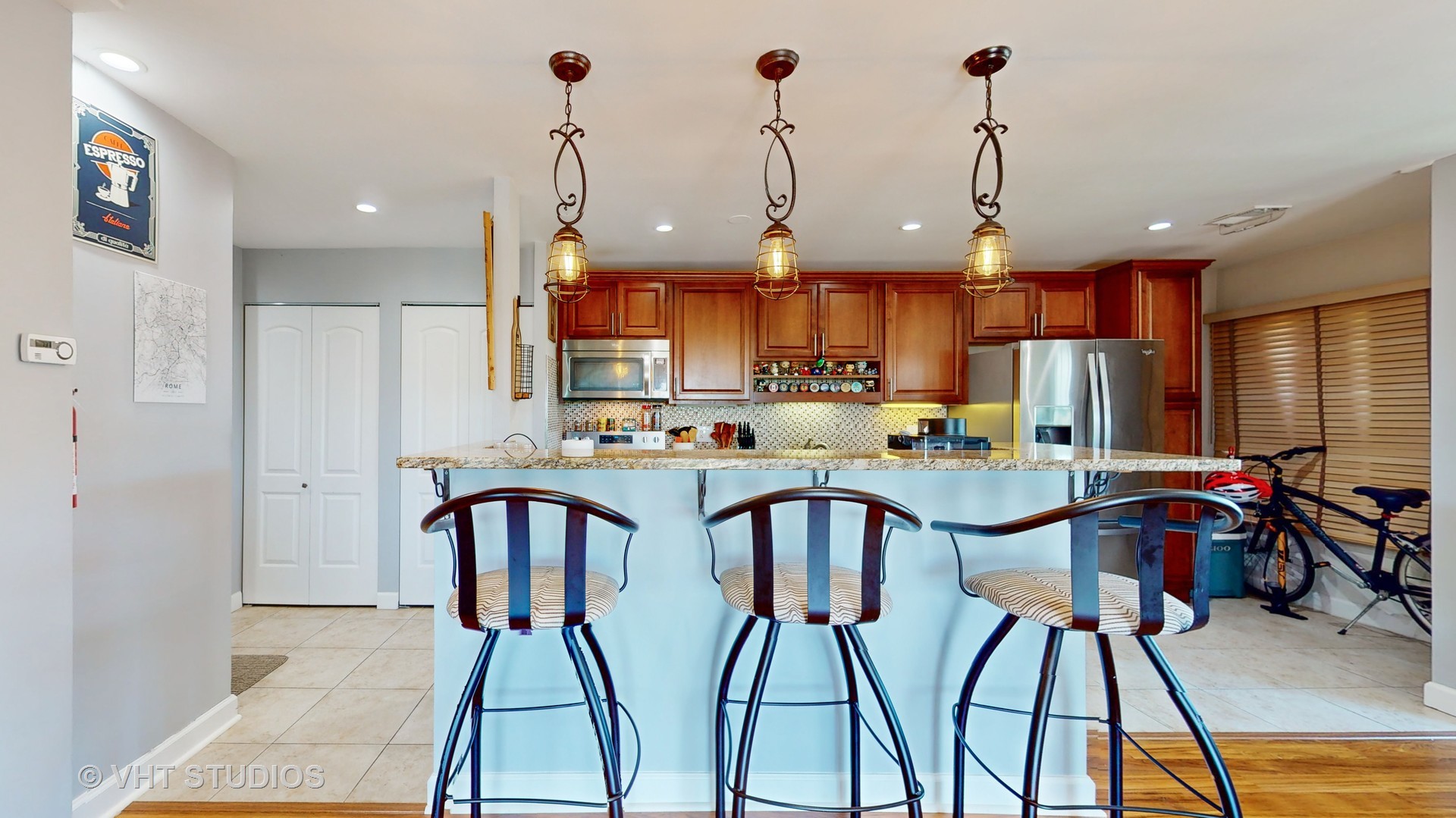 8630 Waukegan Road, Unit 519 Morton Grove, IL 60053 - Photo 14 of 26 a view of a dining room with furniture