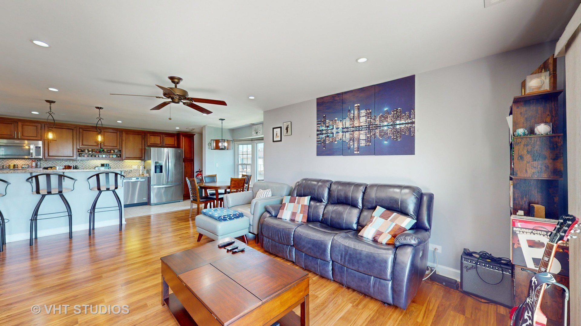 8630 Waukegan Road, Unit 519 Morton Grove, IL 60053 - Photo 5 of 26 a living room with furniture and kitchen view