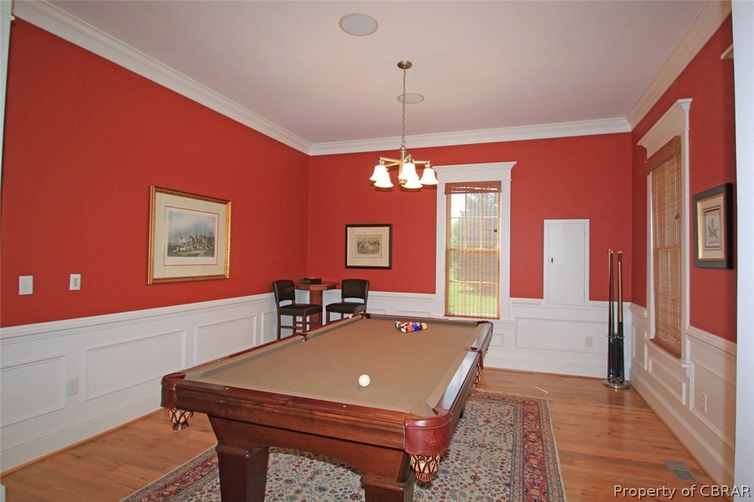 35 West High Bank Road White Stone, VA 22578 - Photo 18 of 37 Formal Dining Room, currently used for billiard room....beautiful moldings & just off the foyer