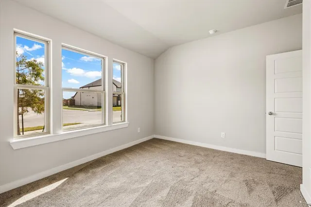 a view of a house with a garden