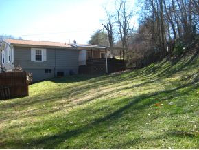 8699 Reedy Creek Road Bristol, VA 24202 - Photo 13 of 18 Covered deck with ceiling fan