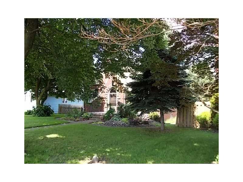 1903 Freeport Road Natrona Heights, PA 15065 - Photo 3 of 17 Exterior Front. the round top front door has a keystone set above...