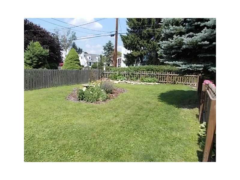 1903 Freeport Road Natrona Heights, PA 15065 - Photo 5 of 17 Exterior Back. view of the fenced backyard...