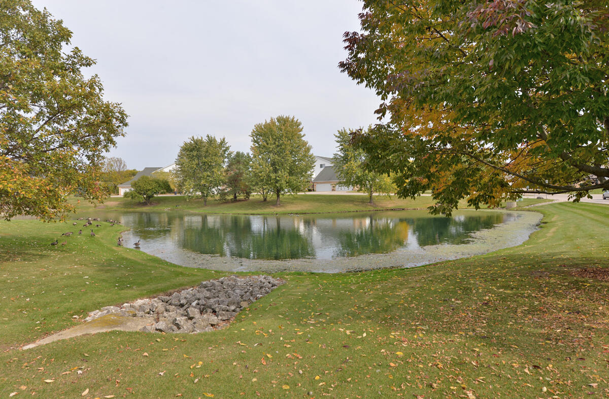 4249 Taylor Harbor West, Unit 6 Mount Pleasant, WI 53403 - Photo 30 of 31 Peaceful Pond Views