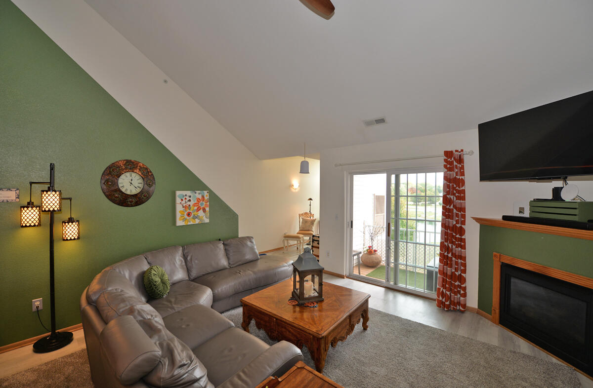 4249 Taylor Harbor West, Unit 6 Mount Pleasant, WI 53403 - Photo 5 of 31 Living Room/Patio Doors