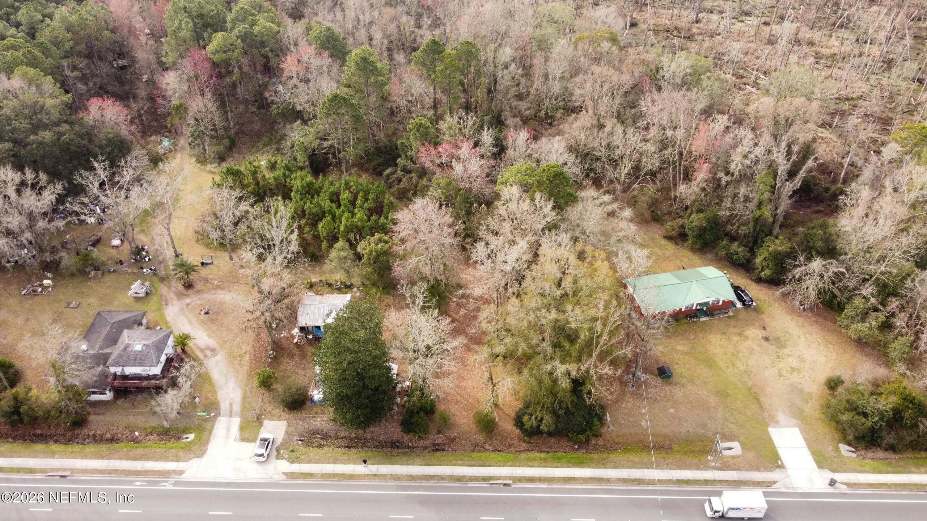 0 200th Road, Unit STATE Yulee, FL 32097 - Photo 6 of 17 a view of a yard from a tree