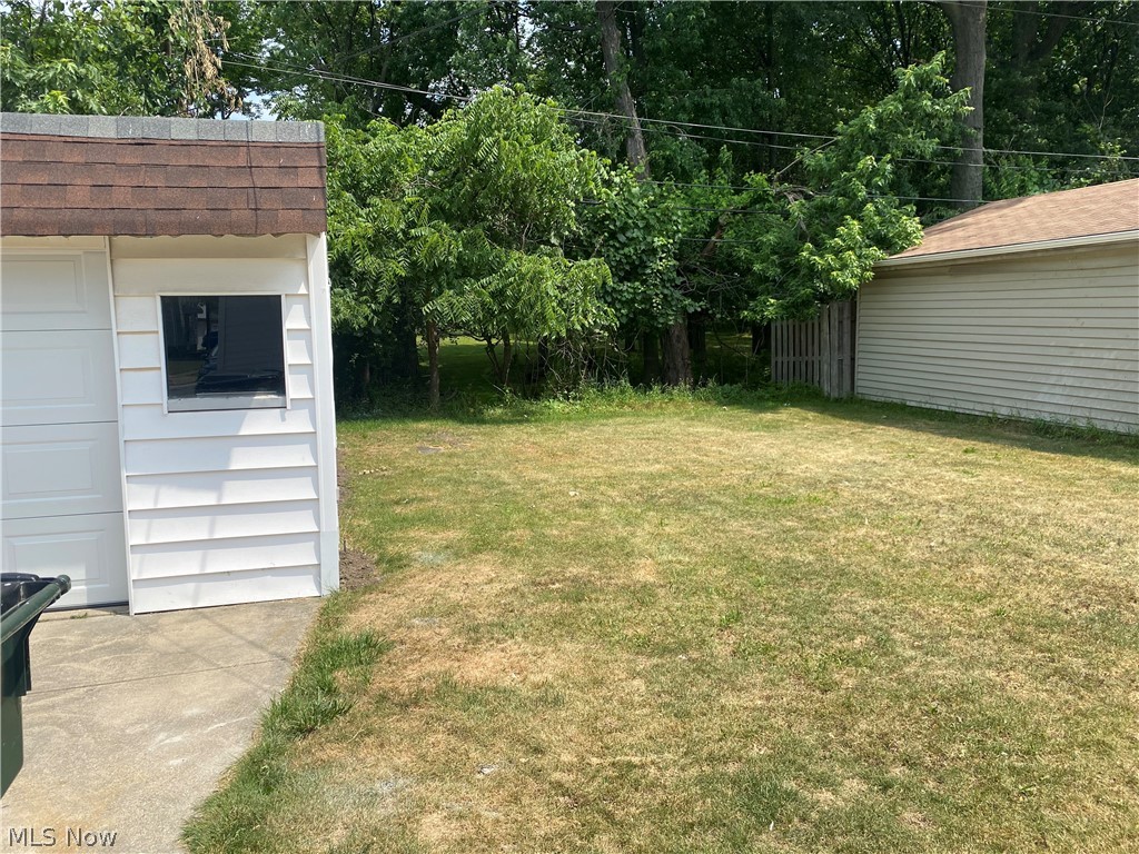 13117 Silver Road Garfield Heights, OH 44125 - Photo 5 of 20 View of yard featuring a garage