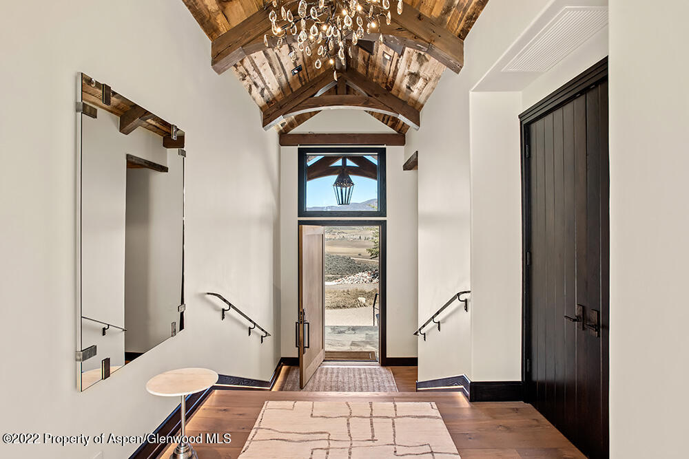 2322 Lazy O Road Snowmass, CO 81654 - Photo 30 of 42 a living room with a couch