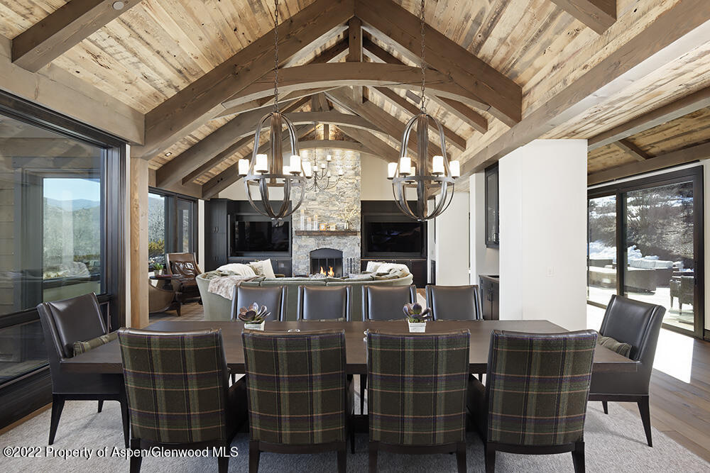 2322 Lazy O Road Snowmass, CO 81654 - Photo 8 of 42 a view of a dining room with furniture window and outside view