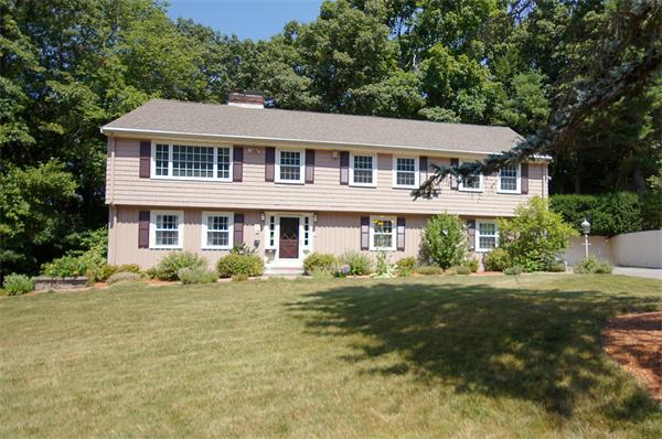 18 Peachtree Road Lexington, MA 02420 - Photo 1 of 22 a front view of a house with a yard