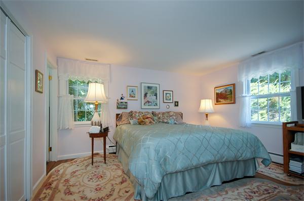 18 Peachtree Road Lexington, MA 02420 - Photo 11 of 22 a bedroom with a bed and a window