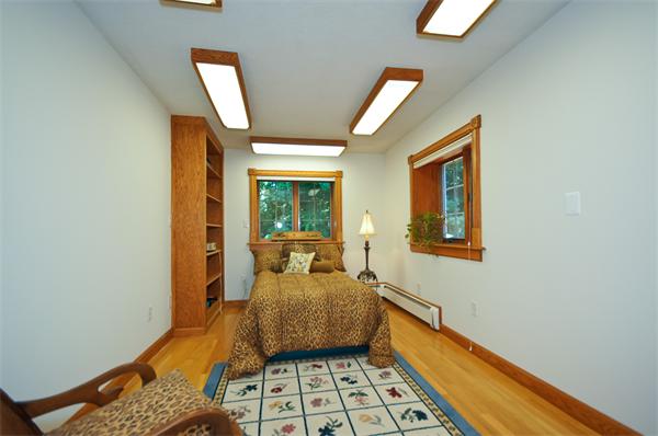 18 Peachtree Road Lexington, MA 02420 - Photo 12 of 22 a bed room with a bed and a window