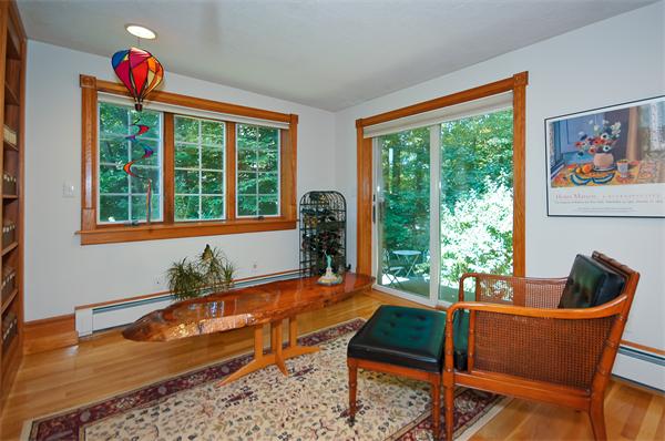 18 Peachtree Road Lexington, MA 02420 - Photo 16 of 22 a living room filled with furniture and a potted plant