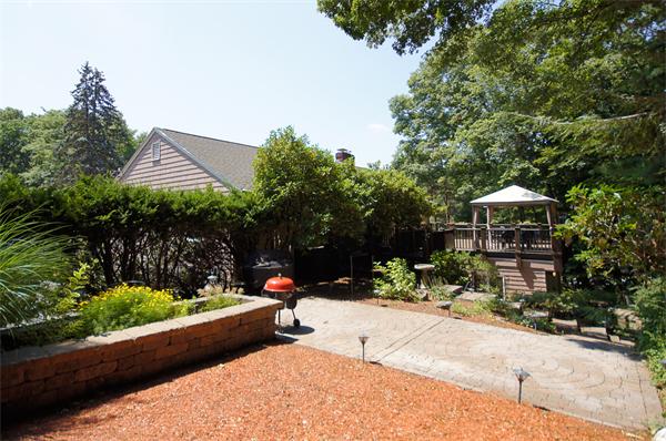 18 Peachtree Road Lexington, MA 02420 - Photo 17 of 22 a view of a backyard with sitting area