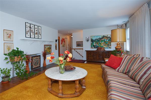 18 Peachtree Road Lexington, MA 02420 - Photo 6 of 22 a living room with furniture and a fireplace