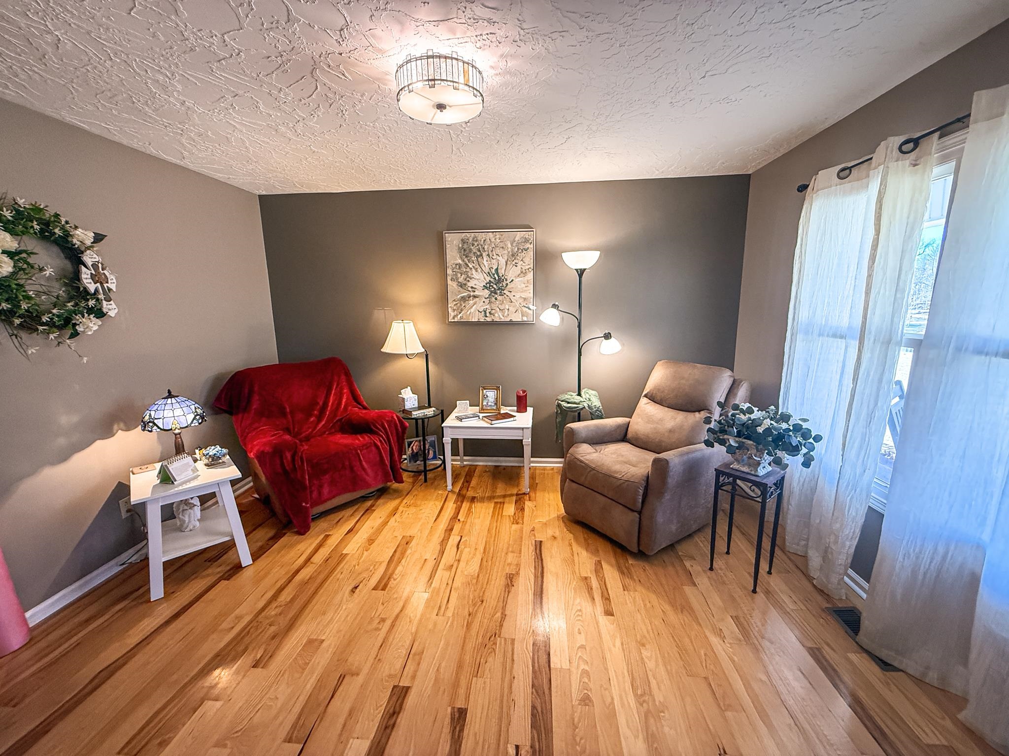 5030 Rogers Marshall Road Union City, TN 38261 - Photo 17 of 40 a living room with furniture and wooden floor
