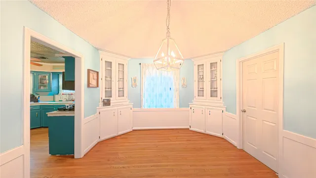 a spacious bathroom with a sink double vanity and a mirror